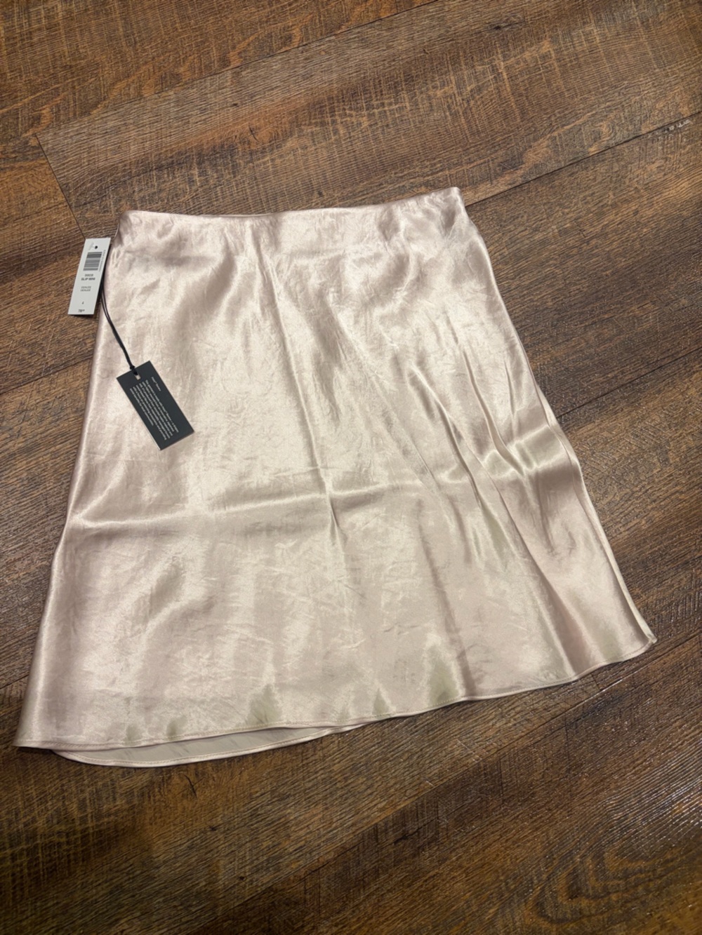 Babaton Satin Mini Skirt in Light pink Champagne